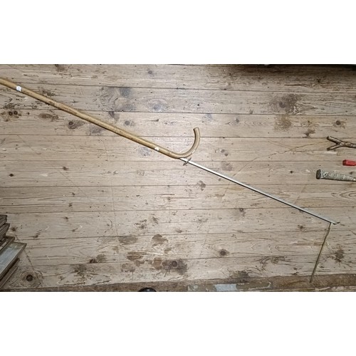 353 - A horse measuring stick, three riding crops and assorted other sporting items (box)