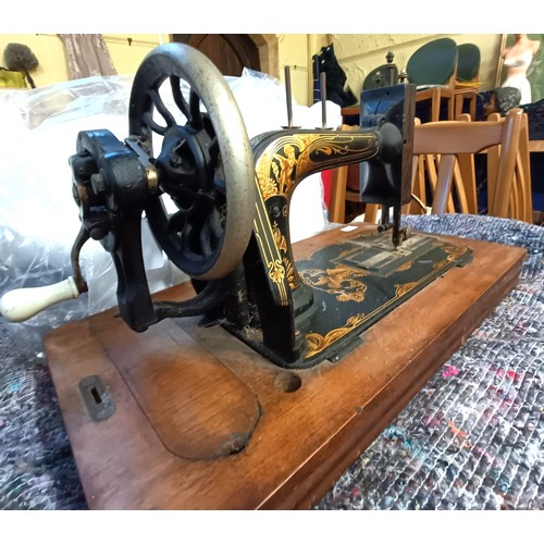 59 - A Stoewer sewing machine, lacking wooden case, 50 cm wide Provenance:  A single owner collection, fr... 