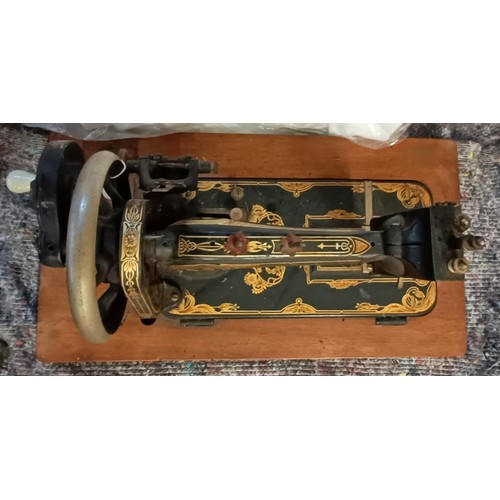 59 - A Stoewer sewing machine, lacking wooden case, 50 cm wide Provenance:  A single owner collection, fr... 