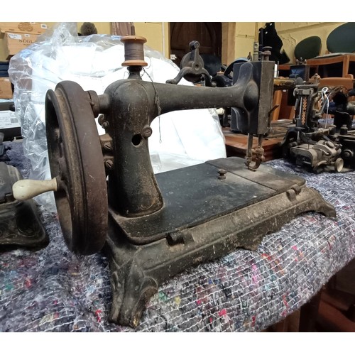 64 - A 19th century sewing machine, 34 cm wide Provenance:  A single owner collection, from the studio of... 