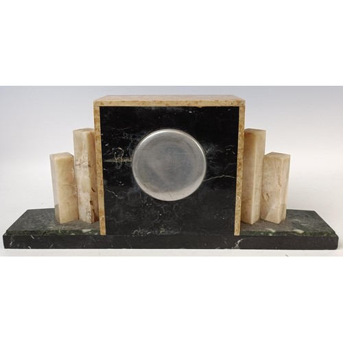 419 - An Art Deco mantel clock, in a marble case, 46 cm wide