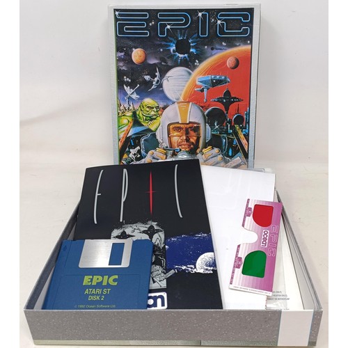 420 - An Atari 520STE, boxed, and assorted games, to include The Killing Game Show, Epic, Speedball 2, Zom... 