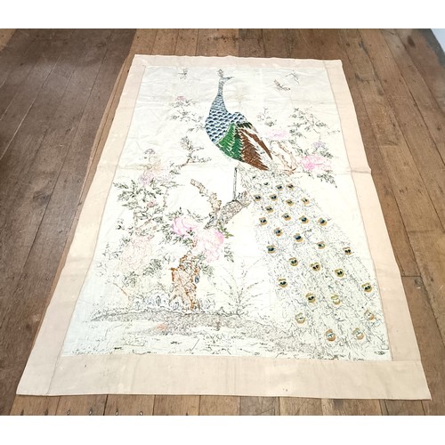 140 - An embroidered panel, decorated peacock, 160 x 124 cm