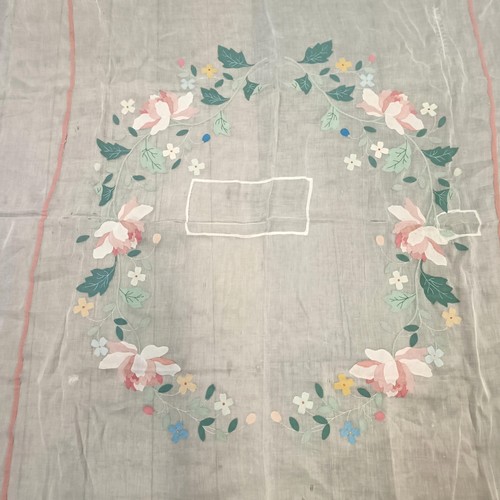 141 - An Art Deco table cloth, decorated flowers, and its pair (2)