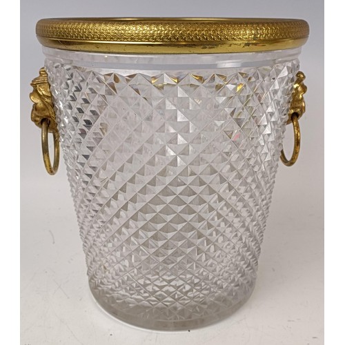 511 - A glass and gilt metal champagne bucket, with lion mask ring handles, 21 cm diameter