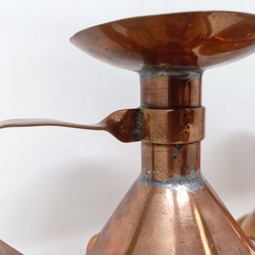 415 - A pair of Liberty Arts & Crafts copper chamber candlesticks, of conical form, 13.5 cm high (2)