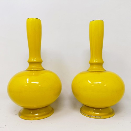 410 - A pair of late 19th century Minton vases, with a yellow glaze, 21 cm high (2)