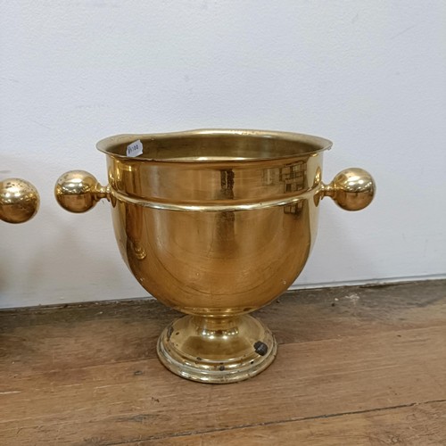 535 - A pair of brass champagne buckets, 28 cm diameter (2)