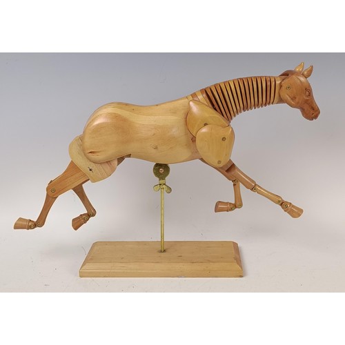 539 - An artists wooden articulated/lay horse, on a stand, 36 cm wide