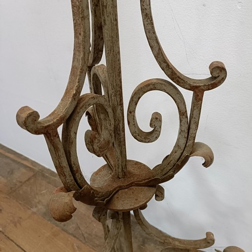 627 - A wrought iron painted standard lamp, 104 cm high