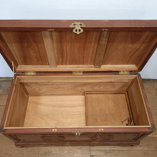 690 - A Chinese camphorwood chest, 93 cm wide