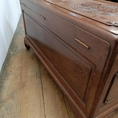 690 - A Chinese camphorwood chest, 93 cm wide