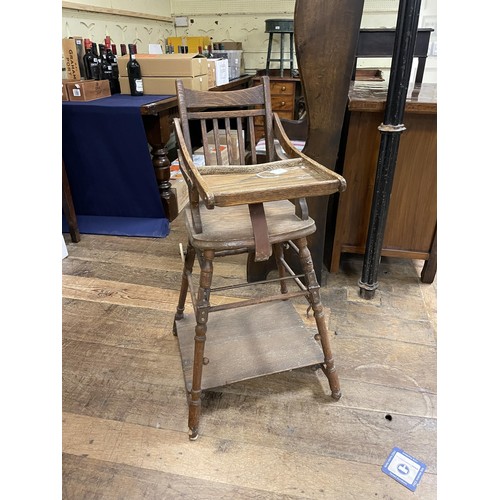 701 - An oak settle, an oak coffer with a replaced top, and a childs highchair (3)