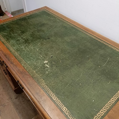 709 - An early 20th century mahogany partners desk, by Maple & Co, stamped to drawer, 156 cm wide