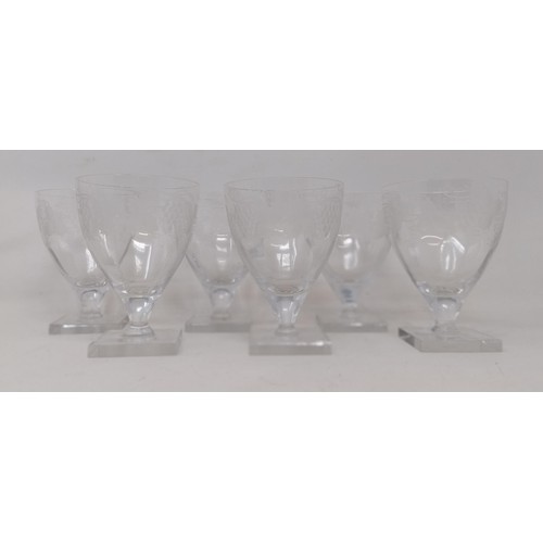 516 - A set of six wine glasses, with conical bowls and cut swag decoration, a set of six wine glasses, wi... 