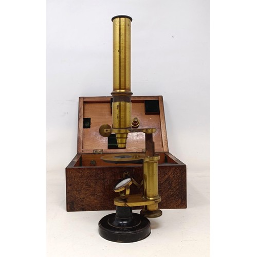 534 - A 19th century students microscope, another microscope, two cameras, a pair of opera glasses, assort... 