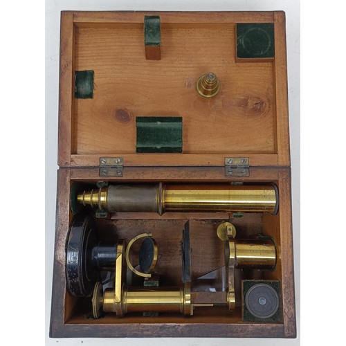 534 - A 19th century students microscope, another microscope, two cameras, a pair of opera glasses, assort... 