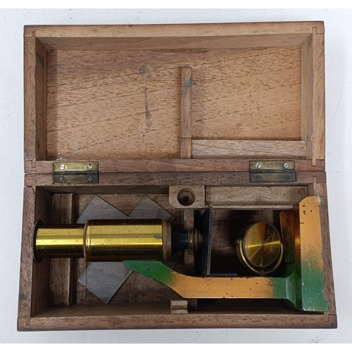 534 - A 19th century students microscope, another microscope, two cameras, a pair of opera glasses, assort... 