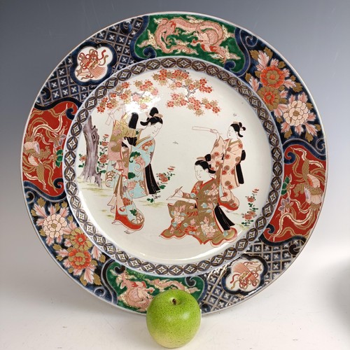 544 - A Japanese charger, 46 cm diameter, and two 19th century Spode New Stone stands (3)