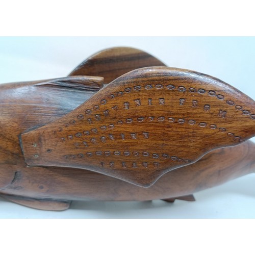 602 - A carved wood Pitcain Islands type fish, John Christian, 40 cm wide