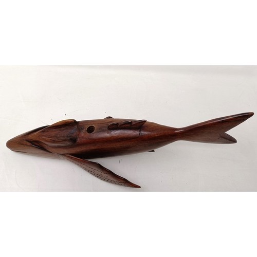 602 - A carved wood Pitcain Islands type fish, John Christian, 40 cm wide