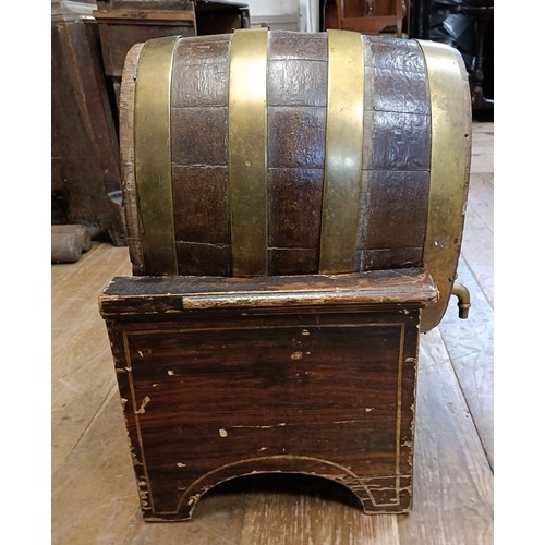 601 - A late 19th/early 20th century Continental brass bound barrel on stand, 33 cm wide