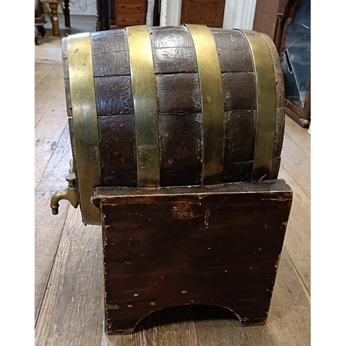 601 - A late 19th/early 20th century Continental brass bound barrel on stand, 33 cm wide