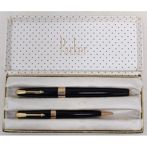 546 - A Parker fountain pen and matching biro, boxed, assorted other items (2 boxes)