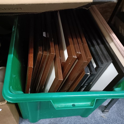 579 - A picture frame and assorted other items (9 boxes)