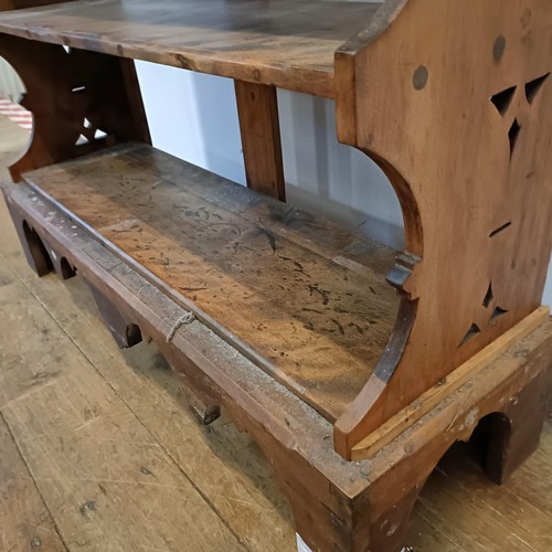 725 - A walnut bookcase, with carved decoration, 97 cm wide