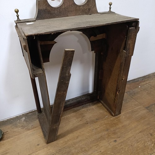 727 - A longcase clock, the arched square painted dial with a phase of the moon, in need of restoration