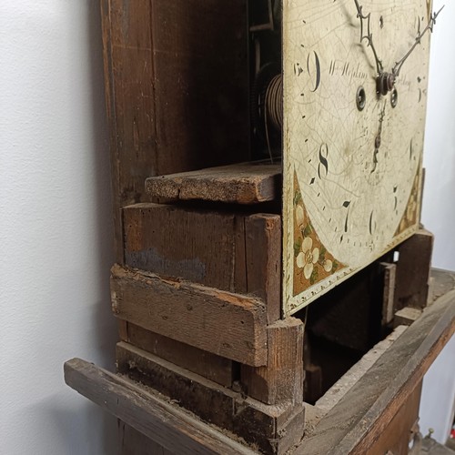 727 - A longcase clock, the arched square painted dial with a phase of the moon, in need of restoration