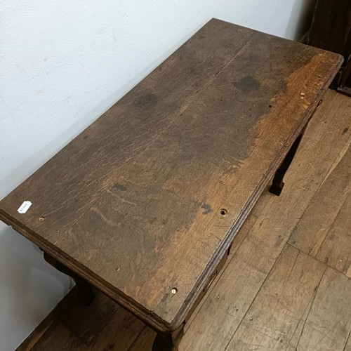 730 - An oak lowboy, having three drawers, 100 cm wide