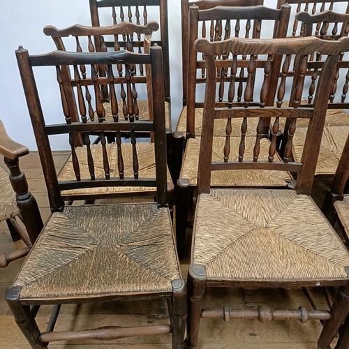 734 - A harlequin set of fourteen spindle back dining chairs (14)