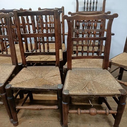 734 - A harlequin set of fourteen spindle back dining chairs (14)