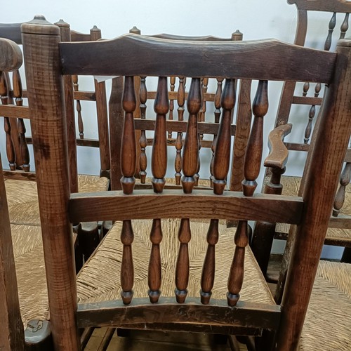 734 - A harlequin set of fourteen spindle back dining chairs (14)