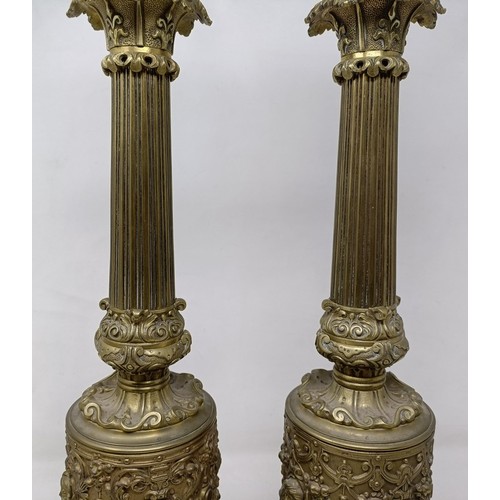 605 - A pair of brass lamps, with neo-classical decoration, 53 cm high (2)