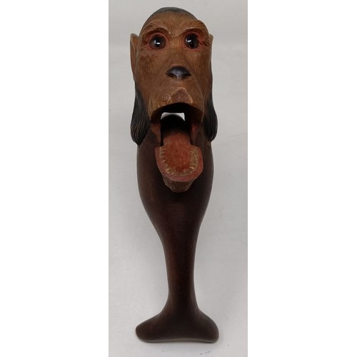 608 - A novelty treen nutcracker, in the form of a monkey