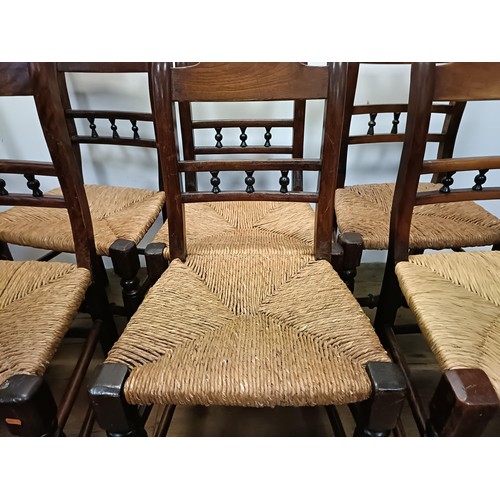 748 - A set of seven Country made elm dining chairs (6+1)