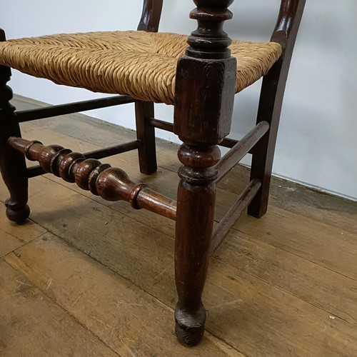 748 - A set of seven Country made elm dining chairs (6+1)