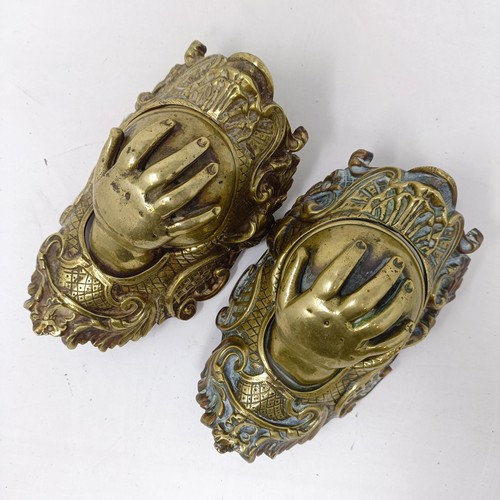 640 - A pair of unusual late 19th/early 20th century brass wall mounts, with drop down compartments in the... 