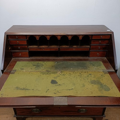 753 - A George III inlaid mahogany bureau, 110 cm wide