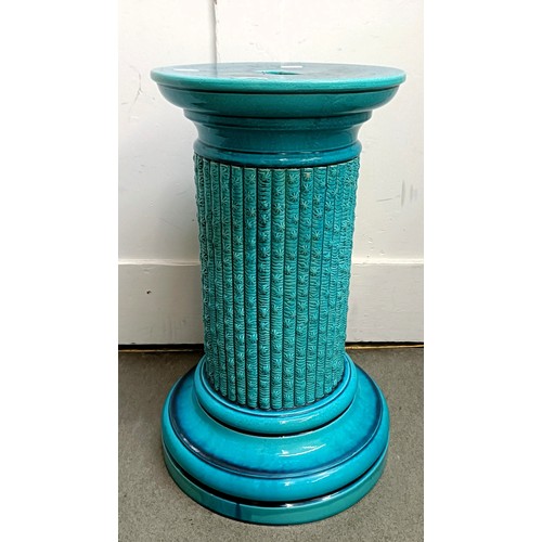 439 - A Burmantofts blue glazed jardinière stand, 60 cm high x 33 cm wide