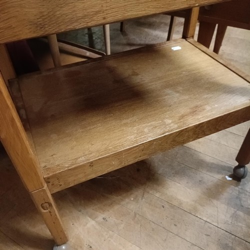 478 - An Alan 'Acornman' Grainger oak two tier trolley, on later castors, 55 x 67 cm