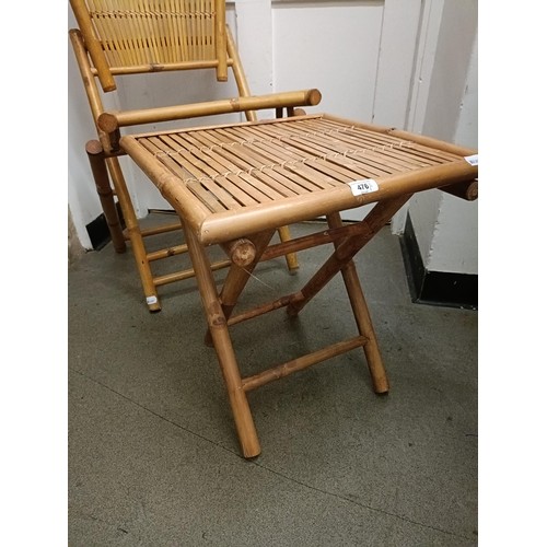 476 - A folding bamboo table and chair (2)