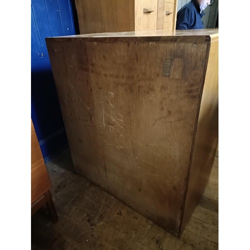 483 - An oak utility secretaire chest, having a fitted drawer above four other drawers, 82 cm wide