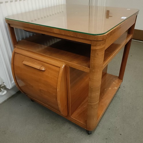 492 - An early 20th century walnut coffee table, set with two compartments, one for records and one for bo... 