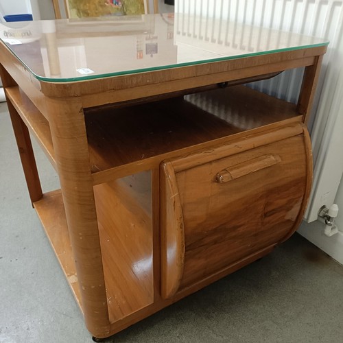 492 - An early 20th century walnut coffee table, set with two compartments, one for records and one for bo... 