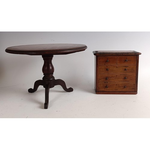 540 - A miniature/apprentice piece tripod table, and a money box, in the form of a chest of drawers (2)