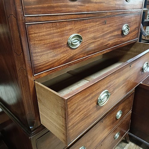 722 - A 19th century mahogany chest on chest, the top having two short and three long drawers, the base wi... 